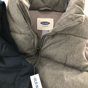 Two fleece lining Old Navy vests.